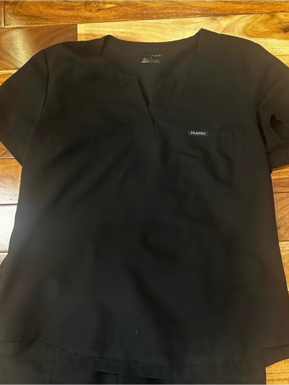 Jaanuu black scrub top large